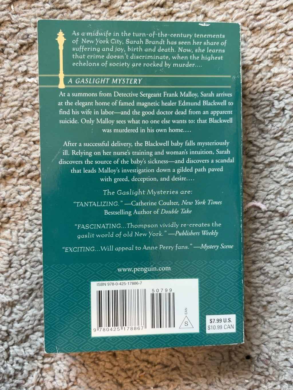 Murder on Gramercy Park by Victoria Thompson — actual used copy, back cover