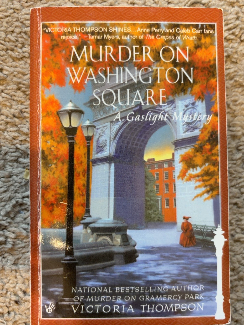 Murder on Washington Square by Victoria Thompson — actual used copy, front cover