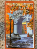 Murder on Washington Square by Victoria Thompson — actual used copy, front cover