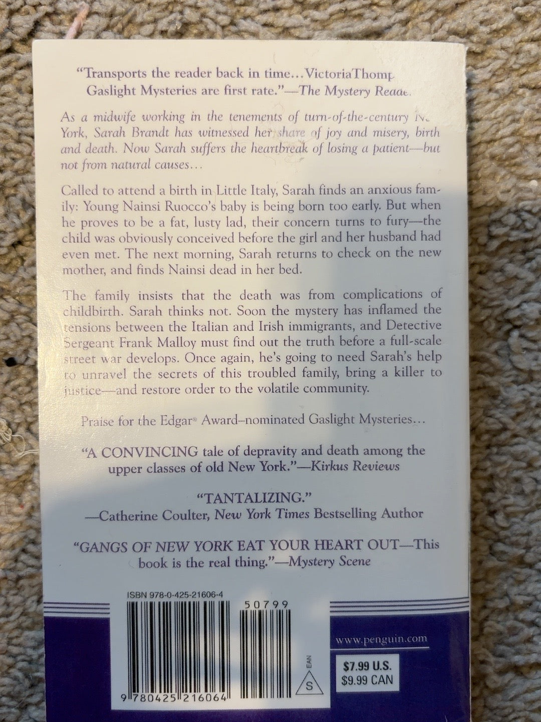 Murder in Little Italy by Victoria Thompson — actual used copy, back cover