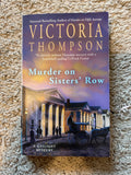 Murder on Sisters' Row by Victoria Thompson — actual used copy, front cover
